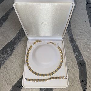 Napier gold and silver two toned necklace and bracelet set.